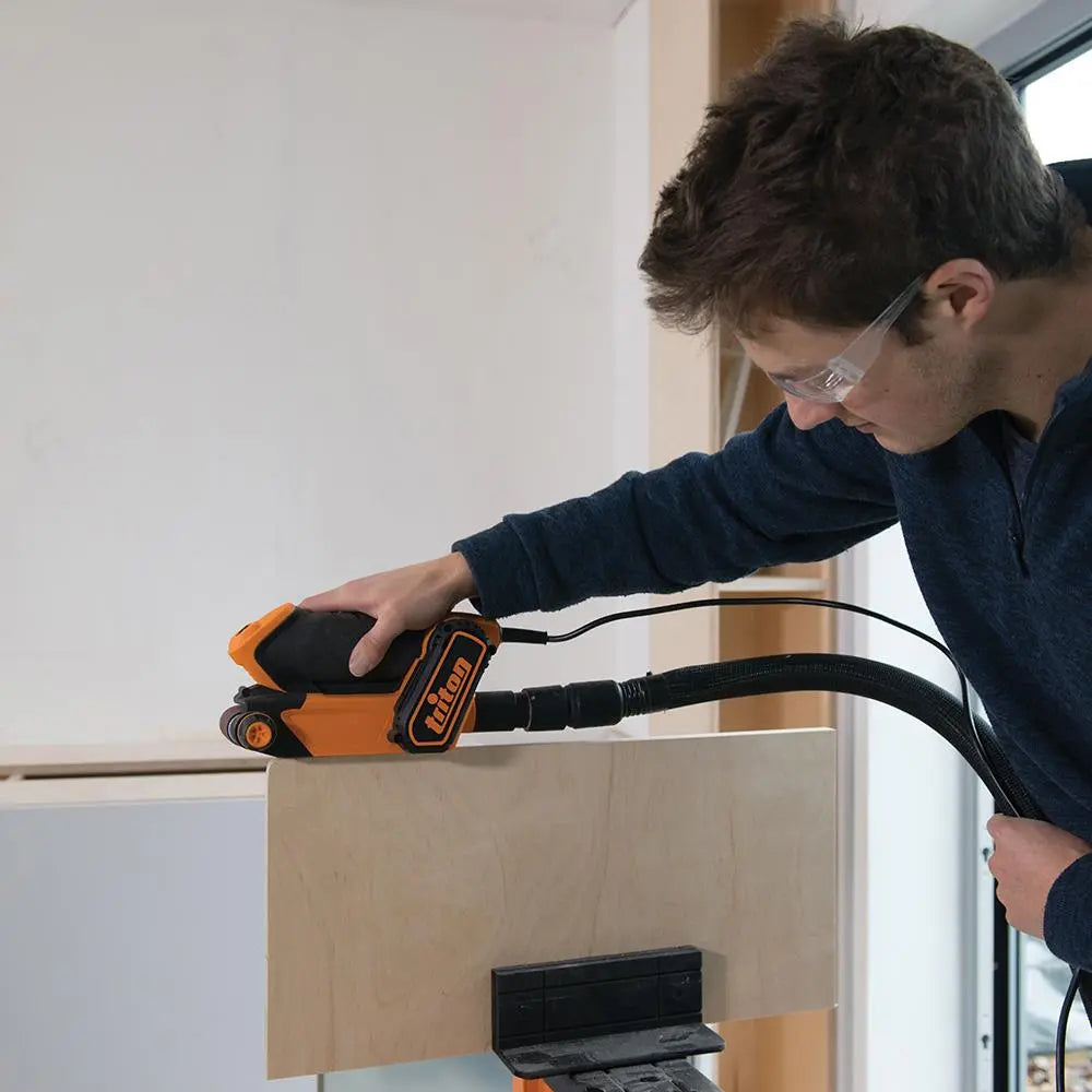 Triton 450W Palm Belt Sander 64mm TCMBS 475114  White Rose Tools