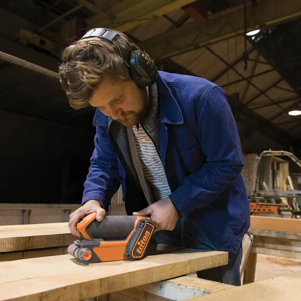 Triton 450W Palm Belt Sander 64mm TCMBS 475114  White Rose Tools